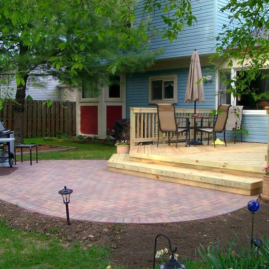 concrete patio and a wood deck
